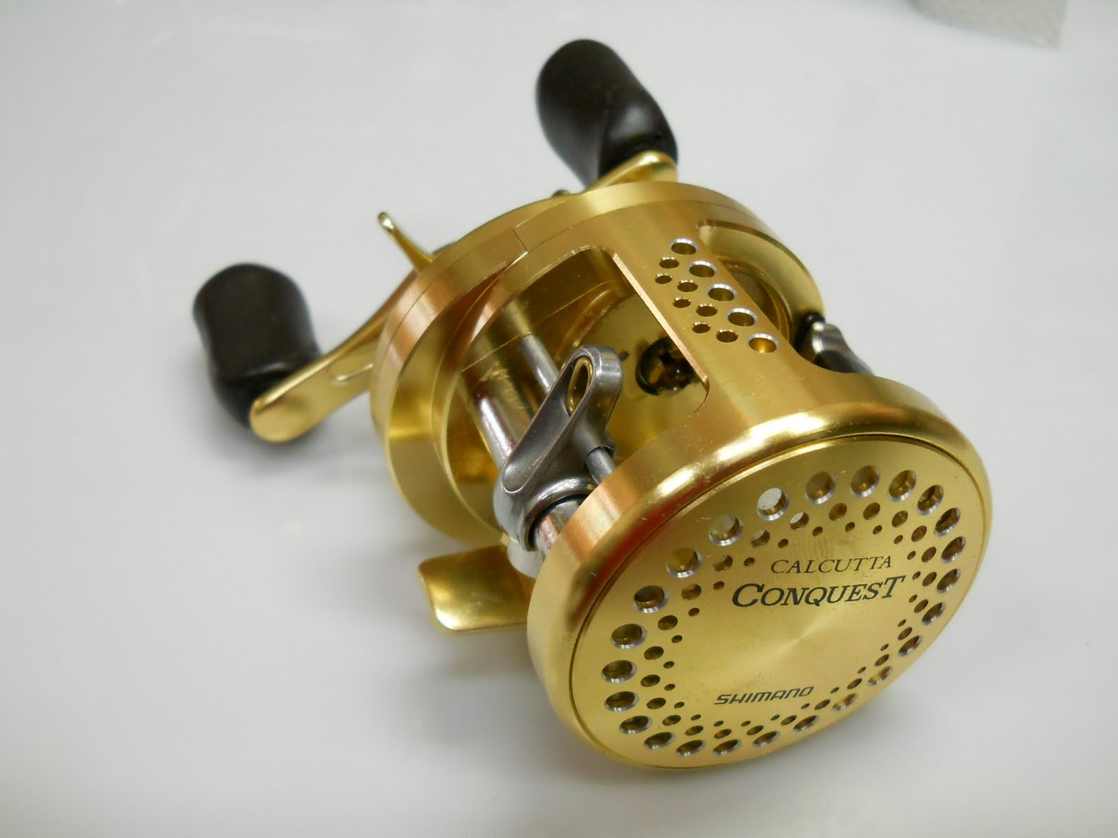 Shimano 21 Calcutta Conquest 100hg (right-handed 10 Shimano 21